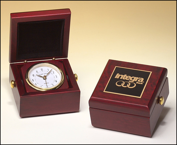 Clock in Mahogany Finish Case.