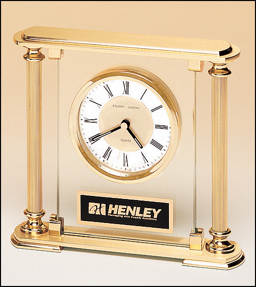 Clock with Metal Goldtone Columns.