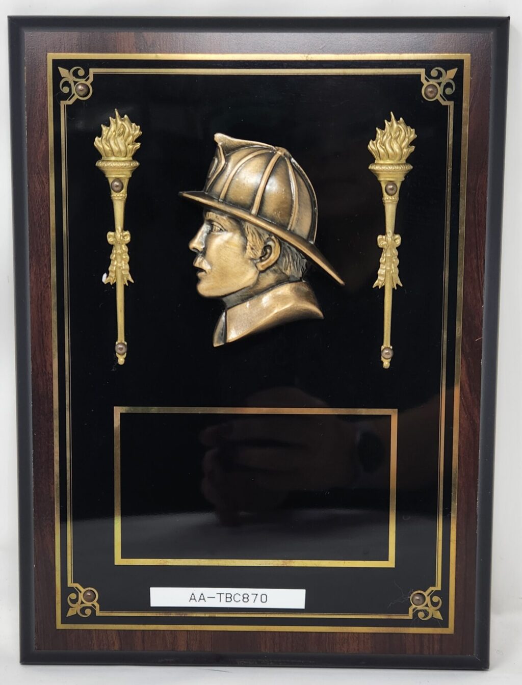 BC870 - Bronze Relief of a Firemans Head.