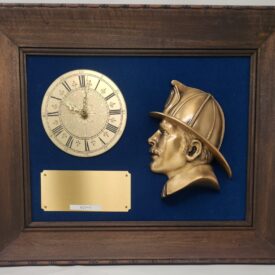 - Blue Velvet Framed Clock with Fireman Head.