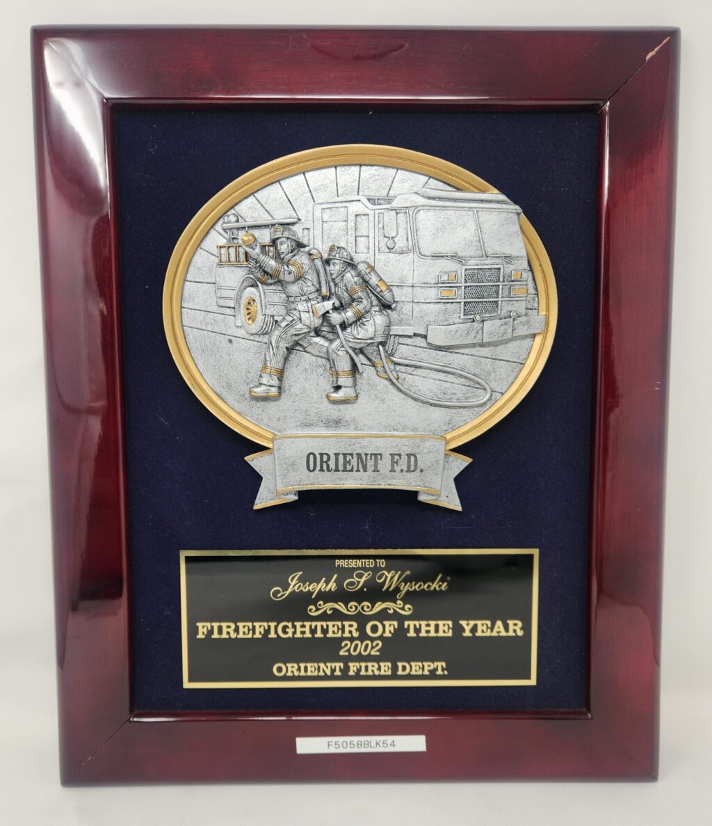 Oval Resin Fire Fighter on Velvet.