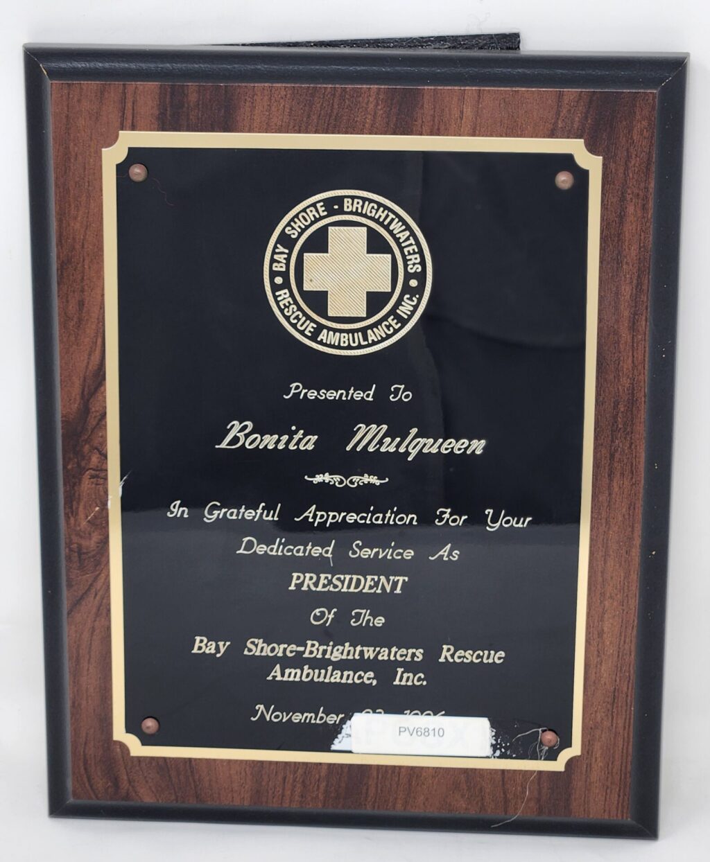 Simulated Walnut Plaque Logo.