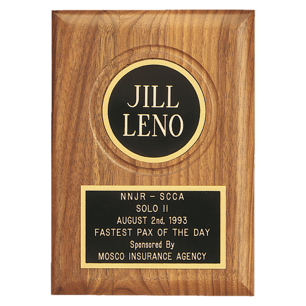 Walnut Plaque with Brass Disc.